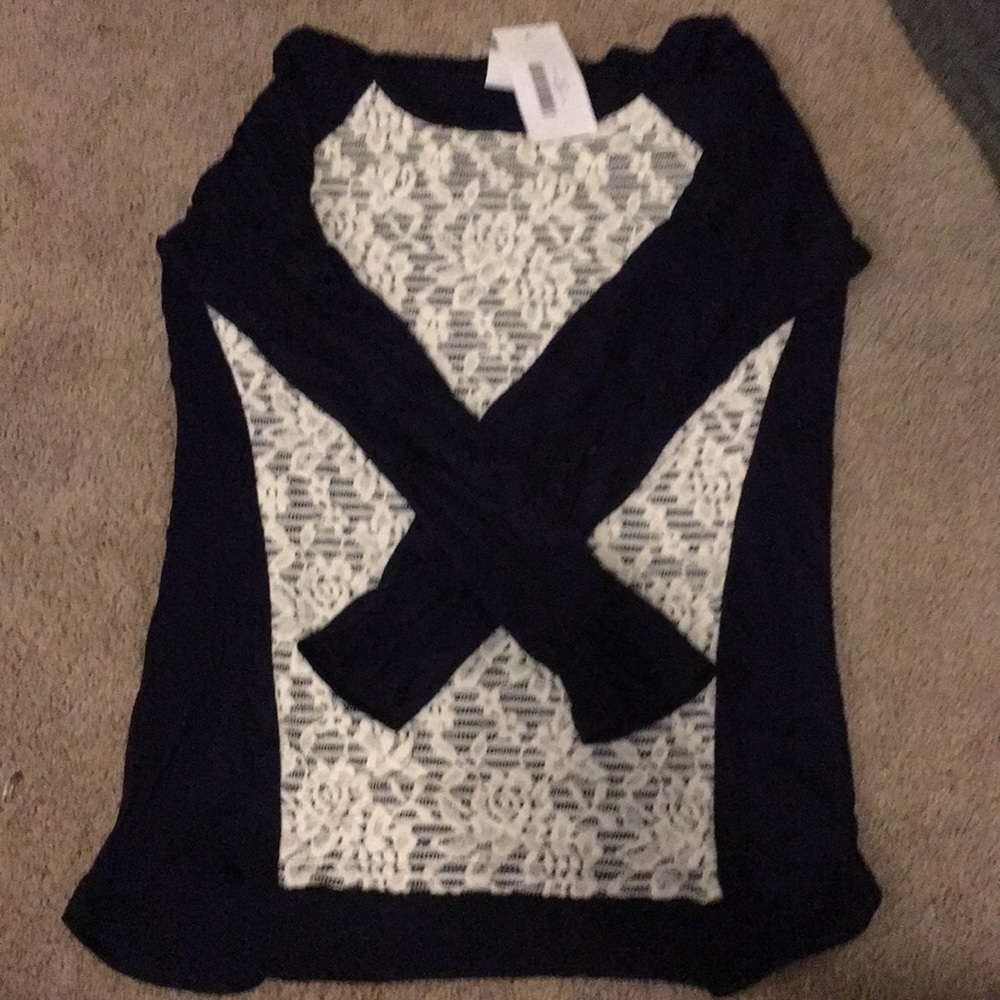 A blue lace front shirt